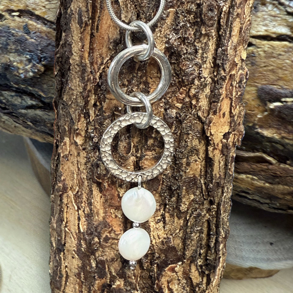 Twin Orbit Sterling Silver Pendant with White Freshwater Pearls